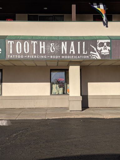 Explore crime scene tattoo ideas, creative tattoo ideas in Davenport, available at Tooth & Nail Tattoo & Piercing