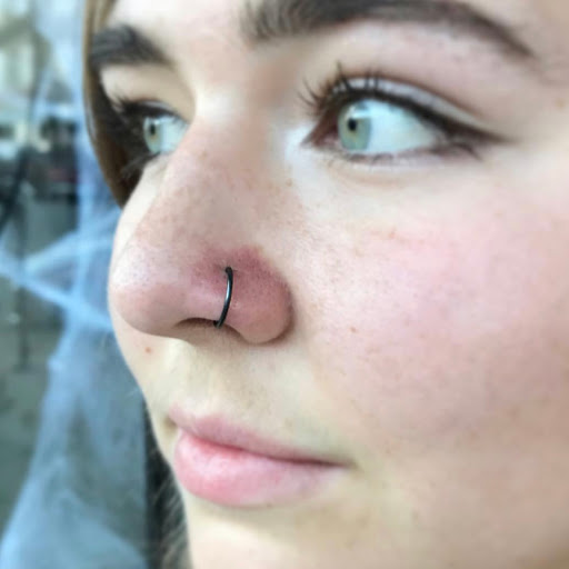 Explore basketball tattoo ideas for guys, creative tattoo ideas in Colorado Springs, available at The Hive Body Piercing & Fine Jewelry