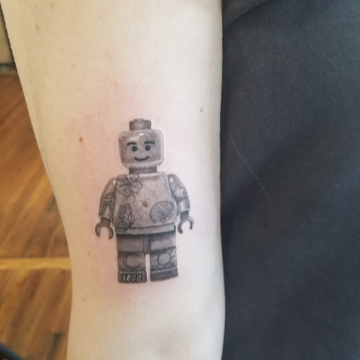 Explore meaningful elegant spine tattoo ideas, creative tattoo ideas in Chattanooga, available at Studio 222