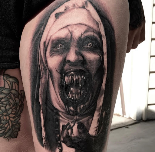 Explore cover up tattoo ideas for upper back, creative tattoo ideas in Odessa, available at Heart And Dagger Tattoo