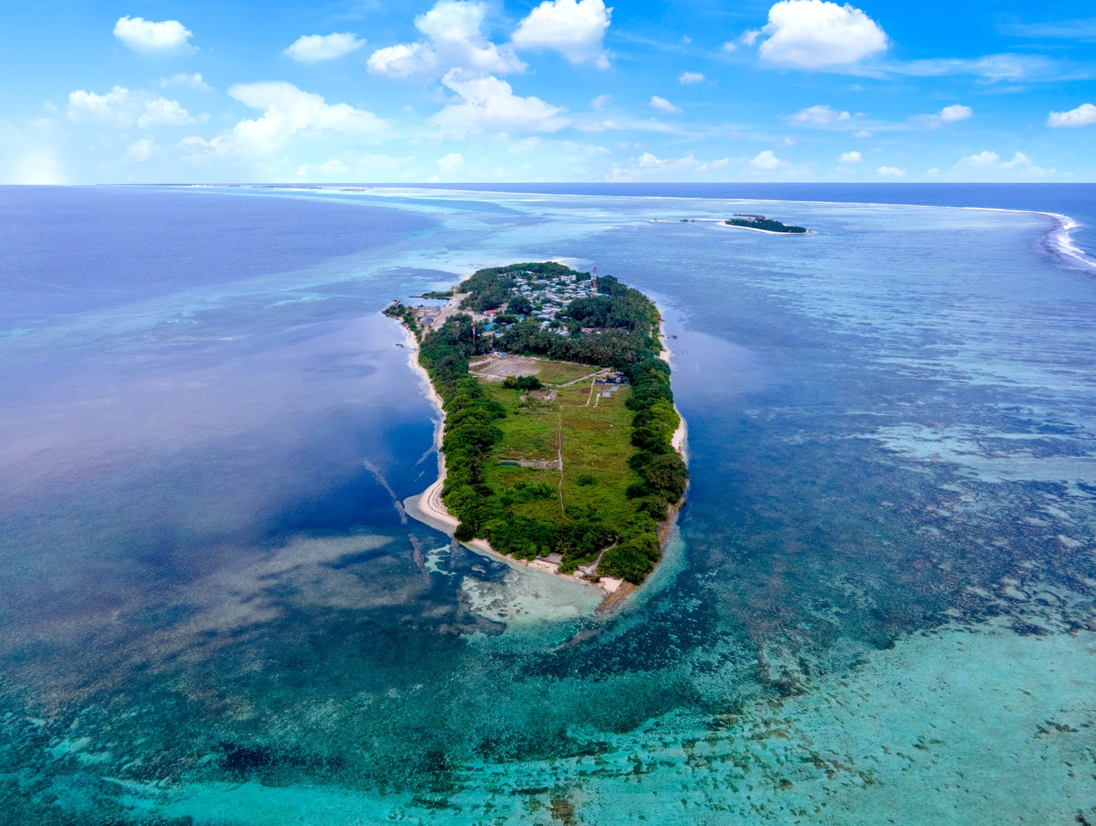 Foto de Sunset Beach con playa amplia