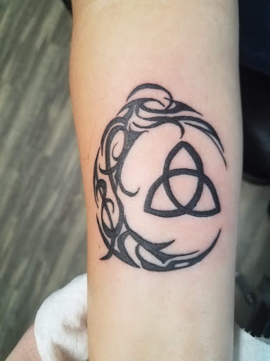 Explore twin tattoo ideas for mom, creative tattoo ideas in Athens, available at United Ink Tattoos and Body Piercings