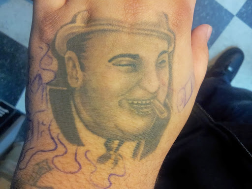 Explore new chapter tattoo ideas, creative tattoo ideas in Blue Island, available at Lil Smittys Tattoo Magic