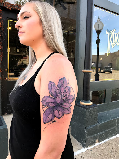 Explore male shoulder tattoo ideas, creative tattoo ideas in Burlington, available at Nine Dot Studio