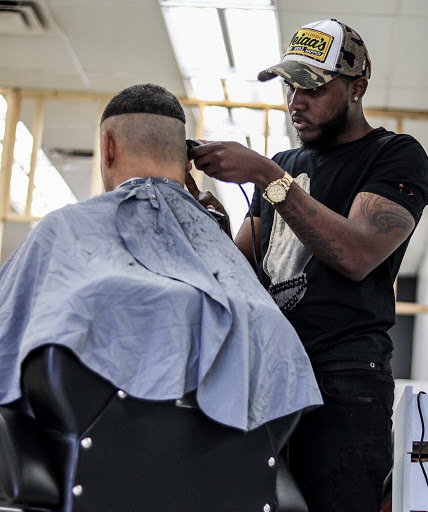 Barber Shop «Unique Barber Shop», reviews and photos, 9251 S Orange Blossom Trail, Orlando, FL 32837, USA