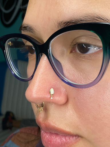 Explore cross tattoo ideas for woman, creative tattoo ideas in San Antonio, available at Platinum Body Piercings