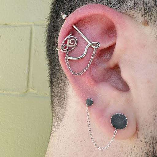 Explore omerta tattoo ideas, creative tattoo ideas in Albuquerque, available at Evolution Body Piercing