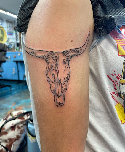 Explore bottom leg tattoo ideas, creative tattoo ideas in Harrisburg, available at Rayzor Tattoos