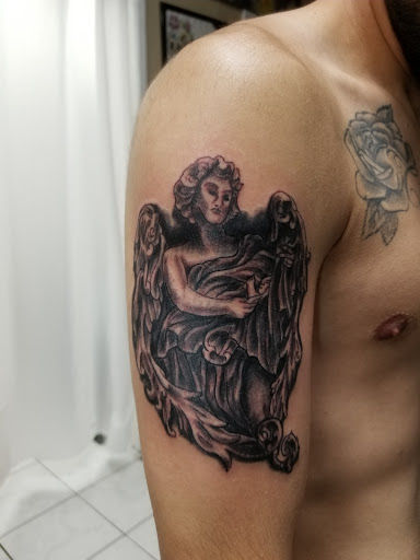 Tattoo Shop «Wildlife Tattoo», reviews and photos, 7149 Winnetka Ave, Winnetka, CA 91306, USA