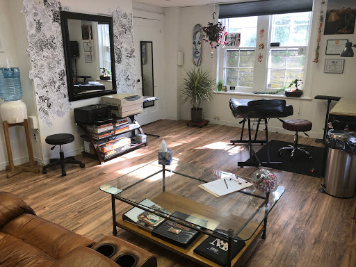 Explore suicidal tattoo ideas, creative tattoo ideas in Kingston, available at Deep Down Tattoo LLC