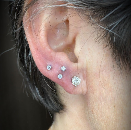 Explore minimal couple tattoo ideas, creative tattoo ideas in Abington, available at Tattoo Galaxy (Abington) Piercing and Custom Tattoos