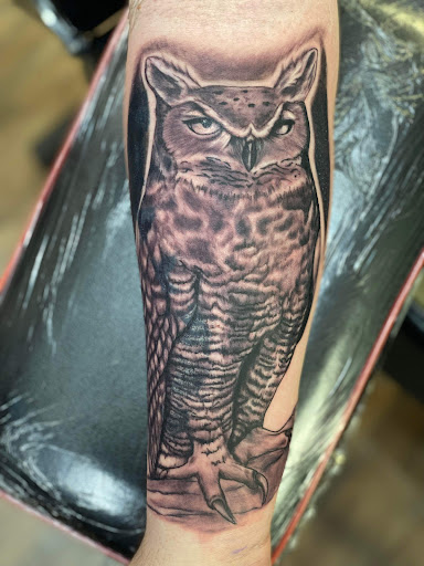 Find earth tattoo ideas for your next unique tattoo in Whiteville at Coup de Gras 2.0 Tattoo and Body Piercing