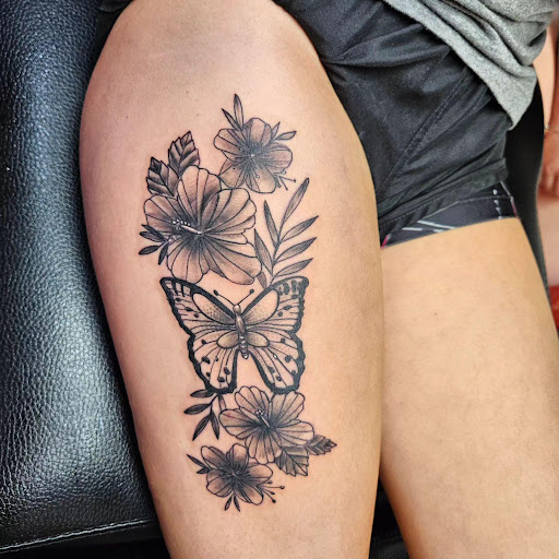 Explore butterfly back tattoo ideas, creative tattoo ideas in Cumberland, available at Queen City Ink