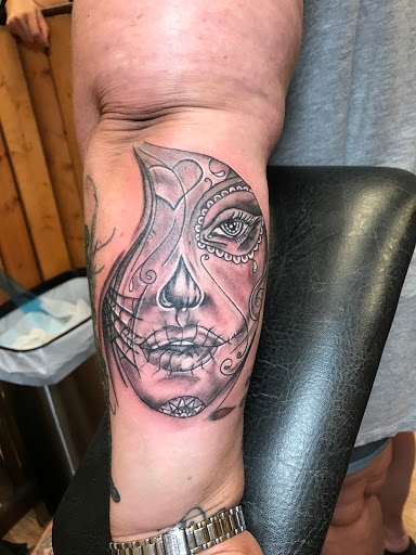 Explore let them tattoo placement ideas, creative tattoo ideas in Orlando, available at Good Vibrations Ink Tattoo and Body Piercing