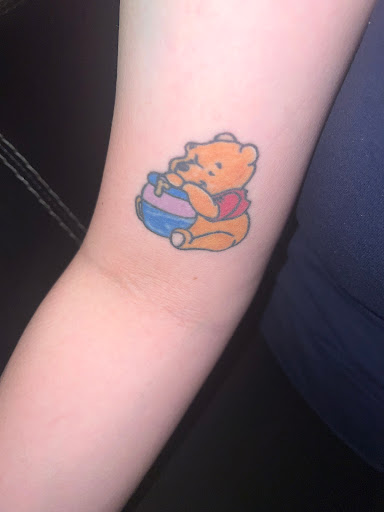 Explore mens behind the ear tattoo ideas, creative tattoo ideas in Watford City, available at Soulful Ink Studios