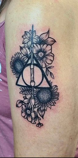 Explore healer tattoo ideas, creative tattoo ideas in Denver, available at Disruptive Ink Tattoos