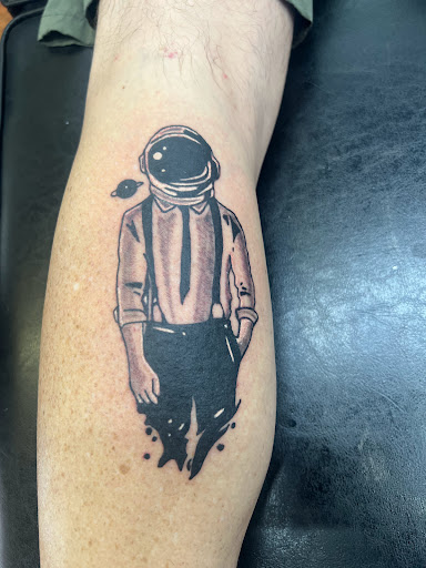 Explore neck tattoo filler ideas, creative tattoo ideas in Cocoa, available at Rorschach Tattoo Shop and Piercing Studio