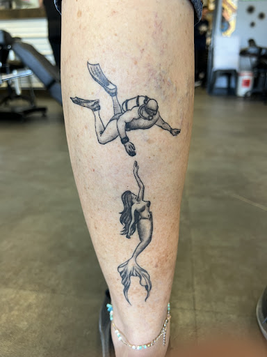 Find gay tattoo ideas for guys for your next unique tattoo in Arlington at Rock and Rose Tattoo