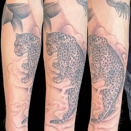 Explore good neck tattoo ideas, creative tattoo ideas in Ithaca, available at Heres To You Tattoo