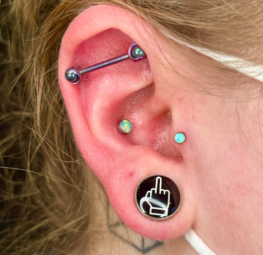 Explore ideas for elbow tattoos, creative tattoo ideas in Bloomington, available at Crystal Moon Body Arts