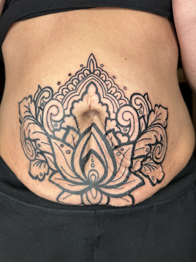 Explore koi fish tattoo sleeve ideas, creative tattoo ideas in Broxton, available at Seratonin Tattoo Parlor