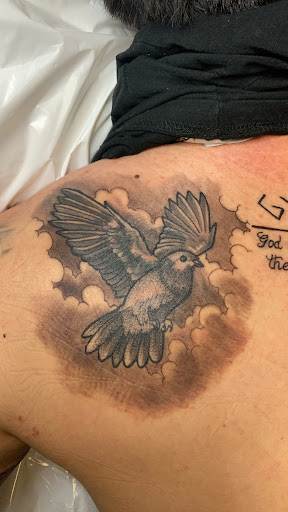 Explore floral tattoo sleeve ideas, creative tattoo ideas in El Paso, available at Santa Rosa Tattoo Studio