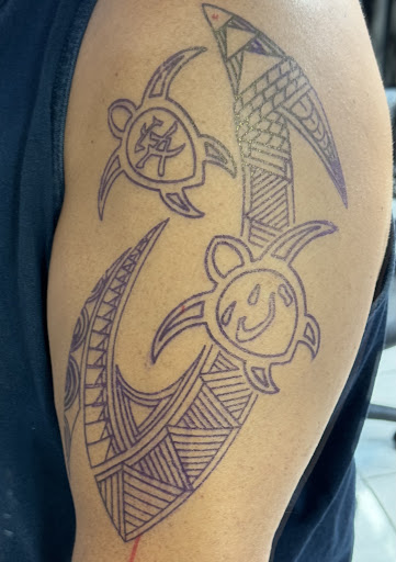 Explore mens arm tattoo ideas small, creative tattoo ideas in Honolulu, available at Sacred Art Tattoo Waikiki