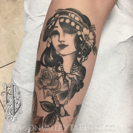 Explore strawberry tattoo ideas, creative tattoo ideas in Wappingers Falls, available at Hudson Valley Tattoo Company