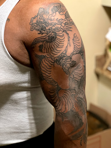 Explore side face tattoo ideas, creative tattoo ideas in Goose Creek, available at Red Kirin Tattoo