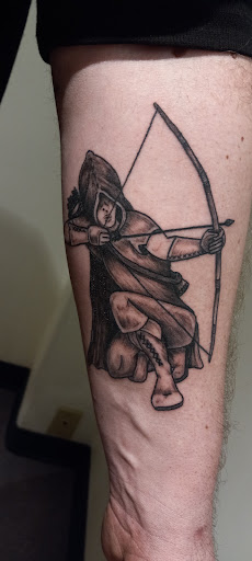 Explore literary tattoo ideas, creative tattoo ideas in Peckville, available at The Chaotic Cauldron Tattoos and More