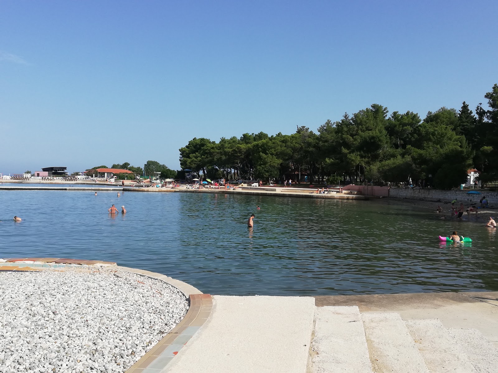 Foto von Vela Draga beach mit betonierte fläche Oberfläche