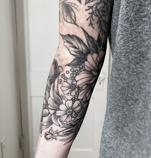 Explore dog print tattoo ideas, creative tattoo ideas in Bellefonte, available at Juniper Studio