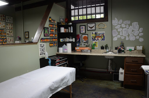 Find arm band tattoo ideas for your next unique tattoo in Paducah at Third Moon Tattoos