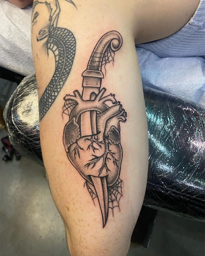 Explore tattoo sleeve filler ideas for a man, creative tattoo ideas in Virginia Beach, available at Studio Evolve