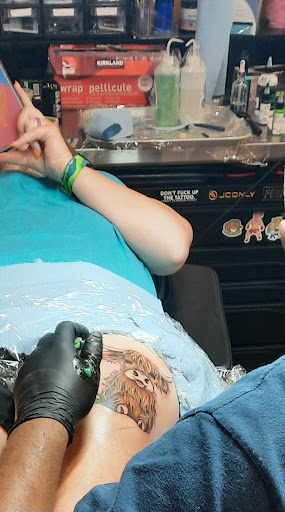 Find cardinal tattoo ideas for ladies for your next unique tattoo in Sioux Falls at Vishnu Bunny Tattoo and Piercing