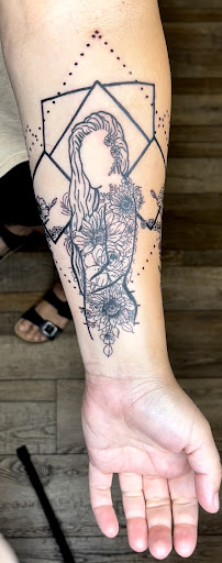 Explore anime neck tattoo ideas, creative tattoo ideas in Clarksville, available at Dark Raine Tattoo