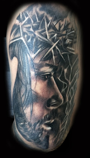 Explore chandelier tattoo ideas, creative tattoo ideas in Washington, available at Fattys Tattoos & Piercings H Street