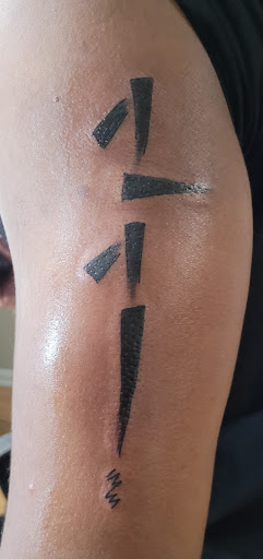 Explore dog tag tattoo ideas, creative tattoo ideas in Meridian, available at SK-Tattoo1