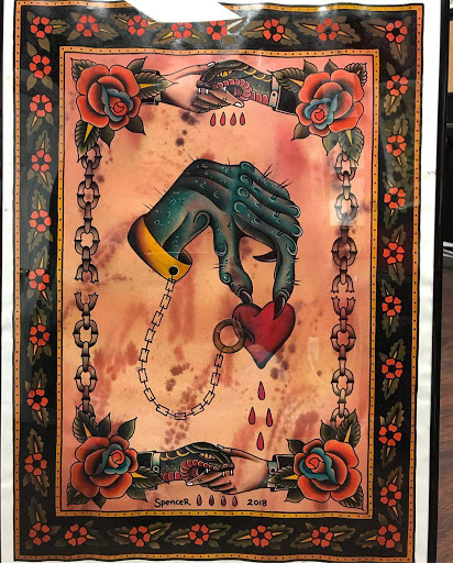 Find owl tattoo ideas for guys for your next unique tattoo in Powell at Against All Odds Tattoos and Piercings