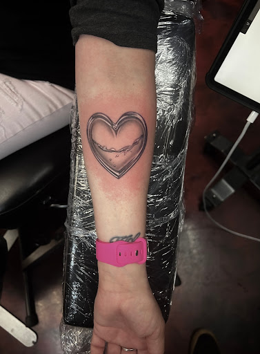 Explore mother and child tattoo ideas, creative tattoo ideas in Silver City, available at Independent Ink Tattoo