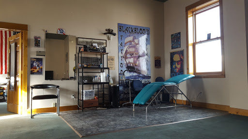 Explore number 2 tattoo ideas, creative tattoo ideas in Lander, available at Blackblood Tattoo and Piercing