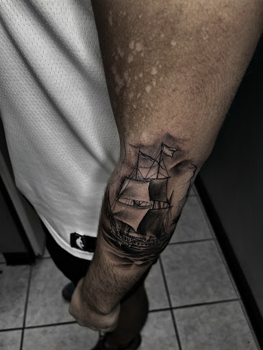 Explore cover up tattoo ideas for chest, creative tattoo ideas in Lavonia, available at 1890 Tattoo Co.