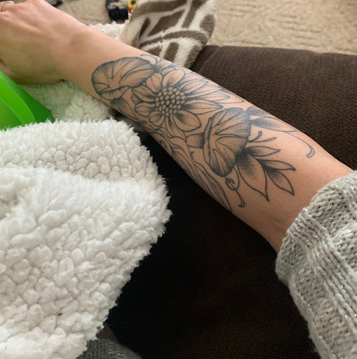 Explore motorbike tattoo ideas, creative tattoo ideas in Massillon, available at Eulogy Tattoo