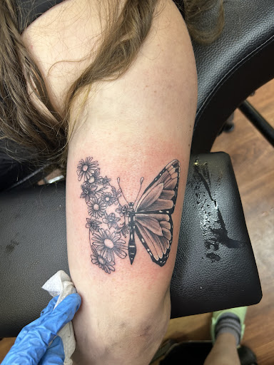 Explore lower tummy tattoo ideas, creative tattoo ideas in Cocoa, available at Rorschach Tattoo Shop and Piercing Studio