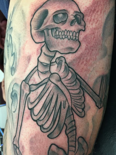 Find music tattoo ideas for men for your next unique tattoo in Albany at Make Your Mark Tattoo