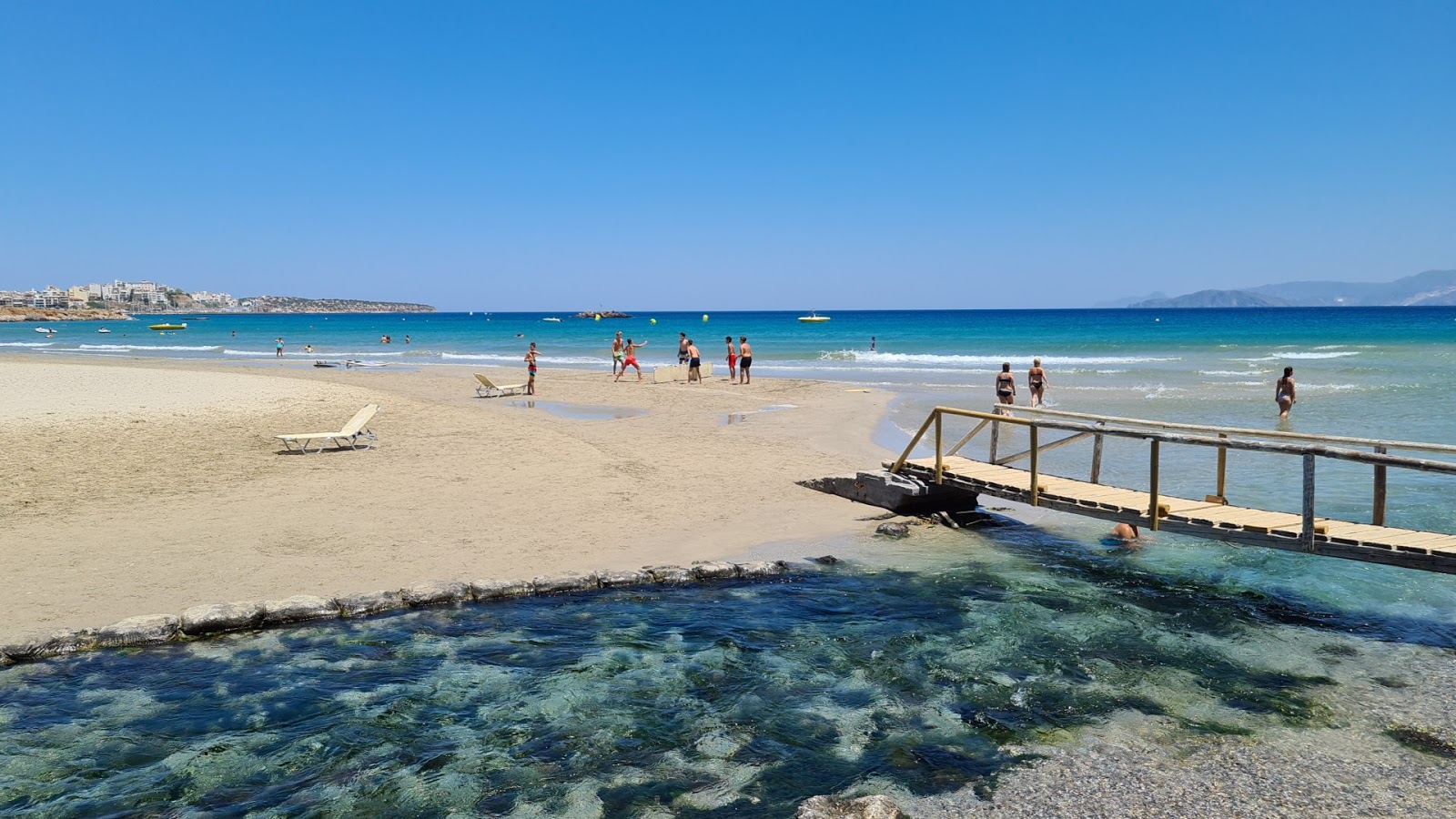 Photo of Almyros beach - recommended for family travellers with kids