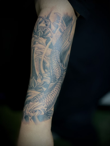 Explore tattoo ideas half sleeve forearm, creative tattoo ideas in Ronkonkoma, available at Ink Buster Tattoo