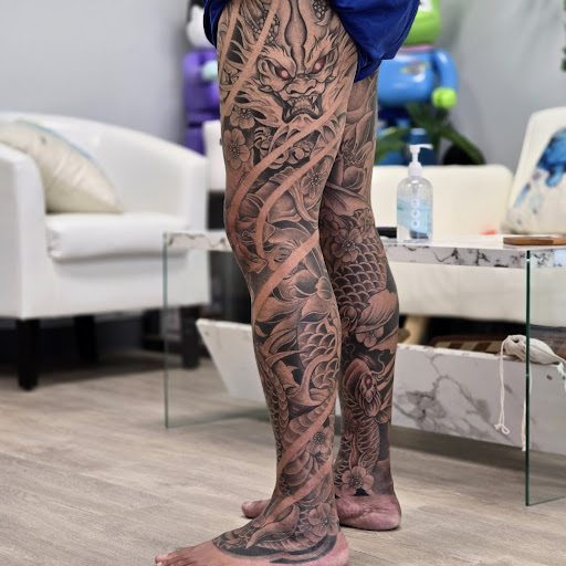 Find beach scene tattoo ideas for your next unique tattoo in Garland at Infamous Art Studio