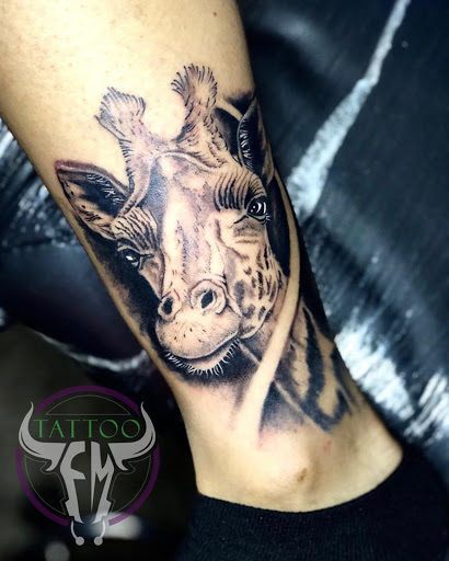 Find in between boob tattoo ideas for your next unique tattoo in Fort Lauderdale at Magik 5 Tattoo