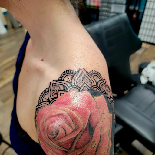 Explore hook tattoo ideas, creative tattoo ideas in Traverse City, available at Pinups & Needles